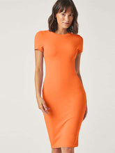 Load image into Gallery viewer, Womens solid black round neck bodycon dress from Ali Express, close-up of the fitted dress fabric and neckline.