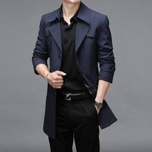 Load image into Gallery viewer, Men's long trench coat by Thoshine, durable outerwear with a classic fit, in a neutral color, designed for stylish protection from the elements.