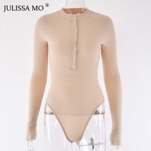 Load image into Gallery viewer, Long sleeve V-neck knitted bodysuit by JULISSA MO in a neutral color, close-up of fabric and neckline detail.
